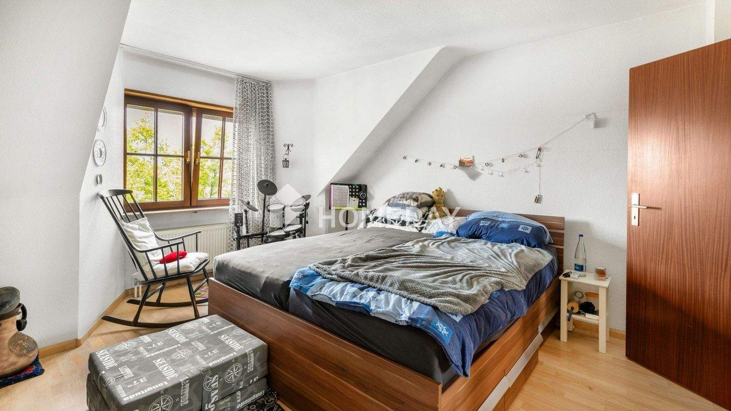 Immobilie in Neulußheim - Mehr Zuhause auf allen Ebenen – DHH mit Loggia, Balkon und wohligem Kaminofen - Bild 13