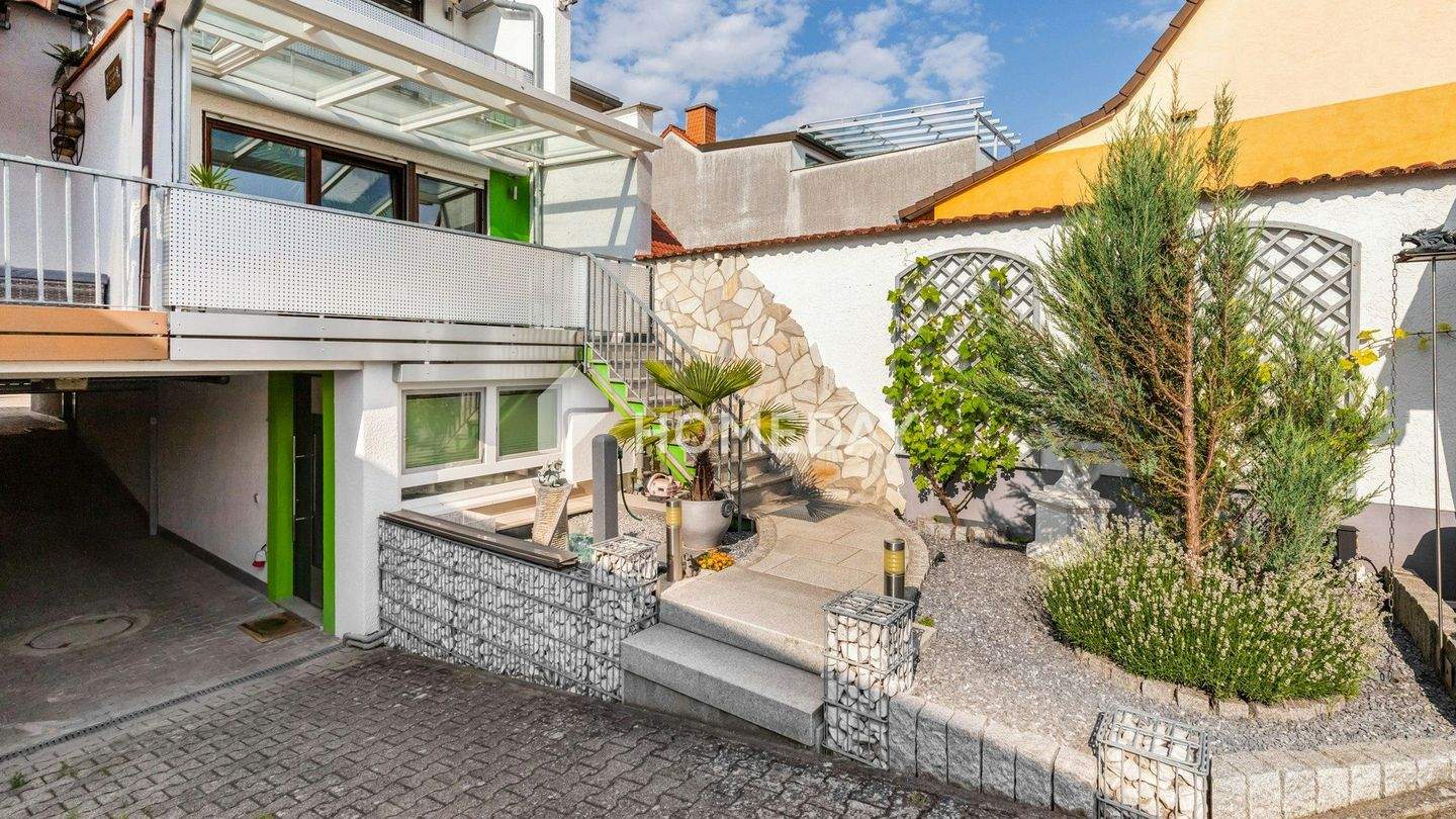 Immobilie in Neulußheim - Mehr Zuhause auf allen Ebenen – DHH mit Loggia, Balkon und wohligem Kaminofen - Bild 2