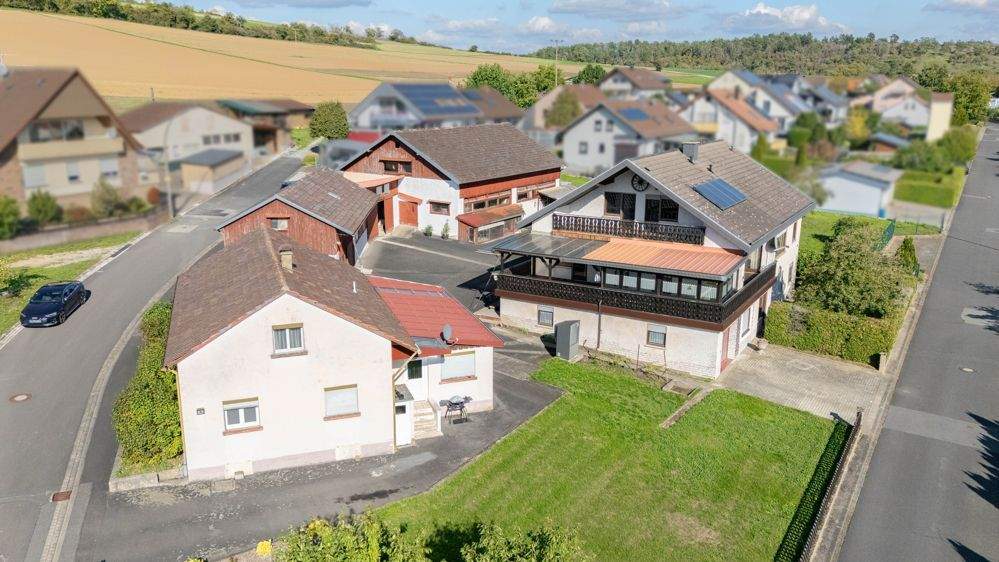 Immobilie in Karbach - Bezugsfreies Einfamilienhaus mit Einliegerwohnung und großem Grundstück! - Bild 18