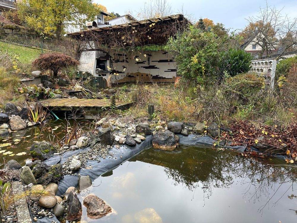 Immobilie in Helsa - Attraktives Einfamilienhaus mit Einliegerwohnung , Garage und Wintergarten in ruhiger Lage von Helsa - Bild 18