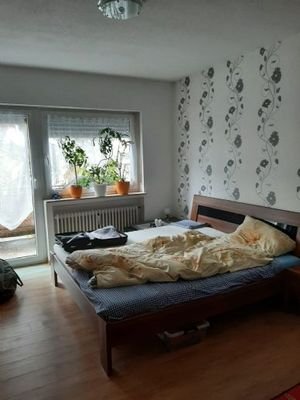 Schlafzimmer mit Balkonzugang