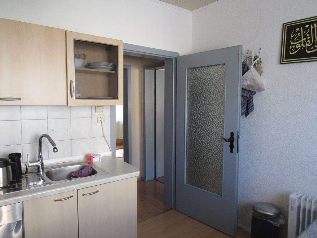 Immobilie in Elz - Schönes Mehrfamilienhaus mit 3 Wohnungen, Nebengebäude, Terrasse, Garage & Garten - Bild 2