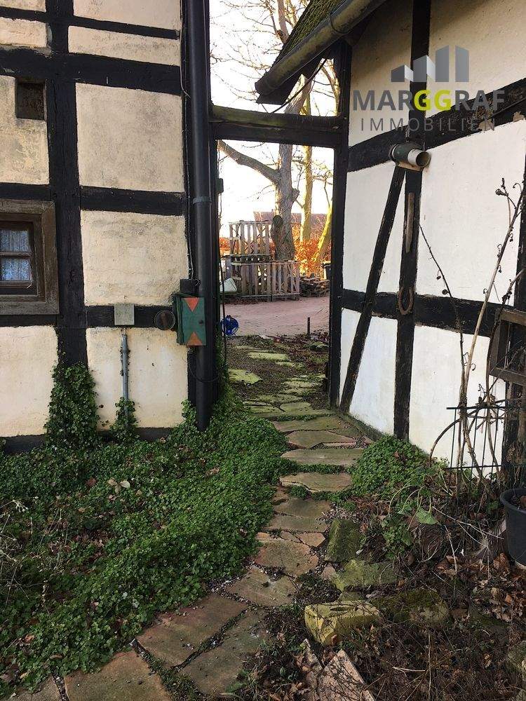 Immobilie in Herford - Denkmalgeschützter, äußerst seltener Doppel-Fachwerkkotten/ Heuerlingshaus in wunderschöner Alleinlage! - Bild 17