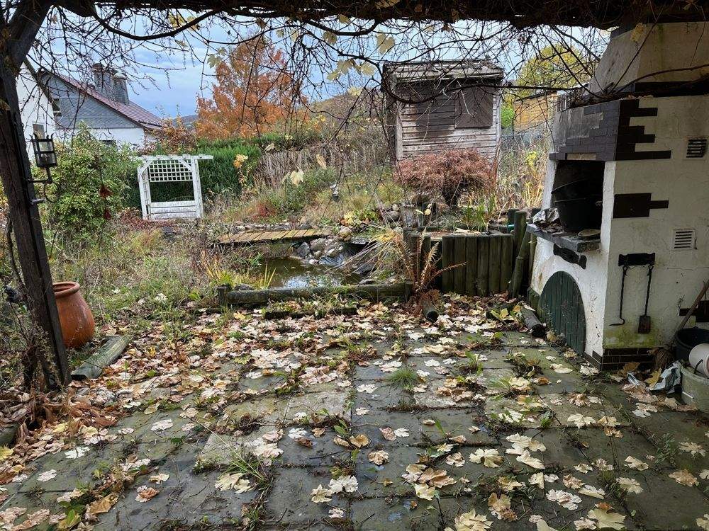 Immobilie in Helsa - Attraktives Einfamilienhaus mit Einliegerwohnung , Garage und Wintergarten in ruhiger Lage von Helsa - Bild 19
