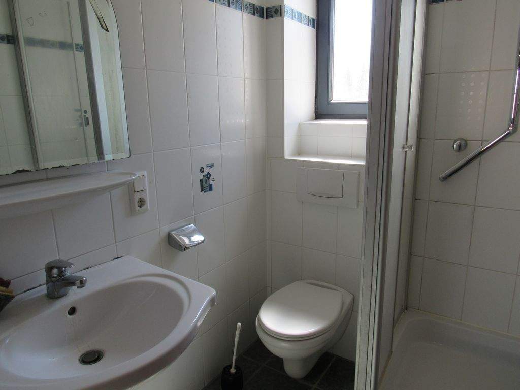 Immobilie in Elz - Schönes Mehrfamilienhaus mit 3 Wohnungen, Nebengebäude, Terrasse, Garage & Garten - Bild 9