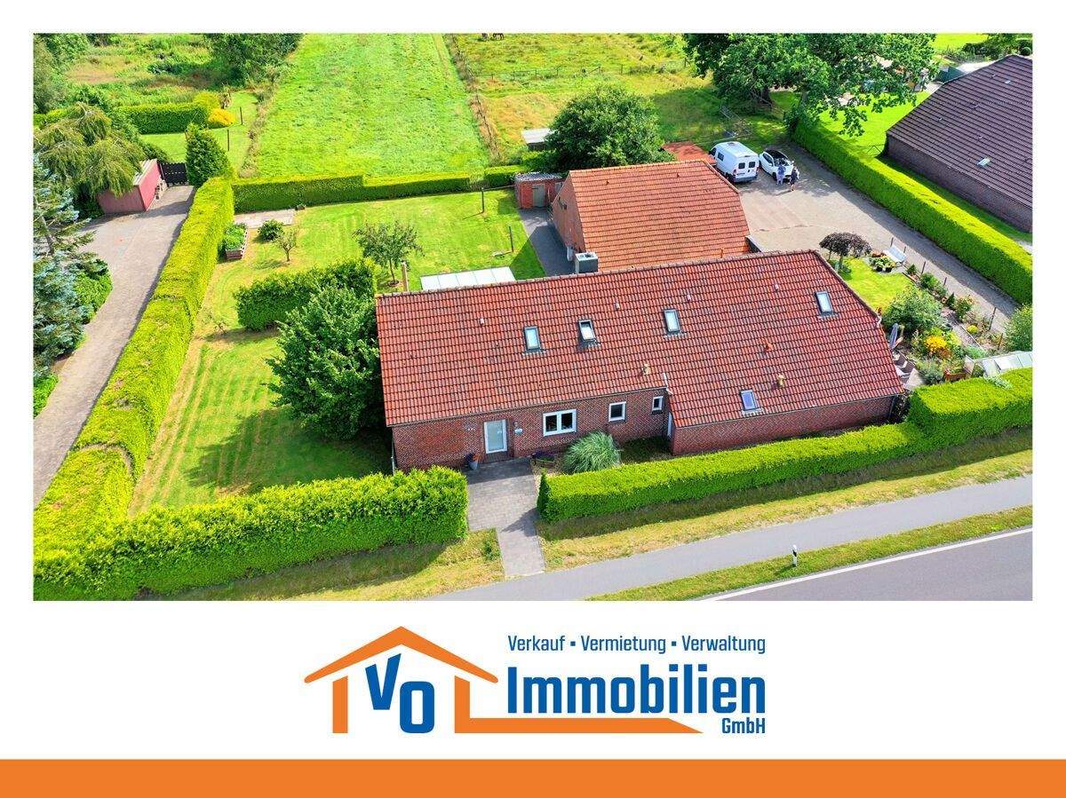 Immobilie in Wiesmoor - Teilsaniertes Landhaus mit Einliegerwohnung, Nebengebäude und über 4 ha Weideland in Wiesmoor - Bild 0