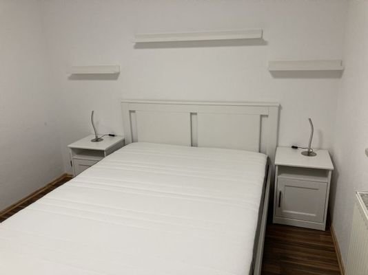 Schlafzimmer mit Doppelbett