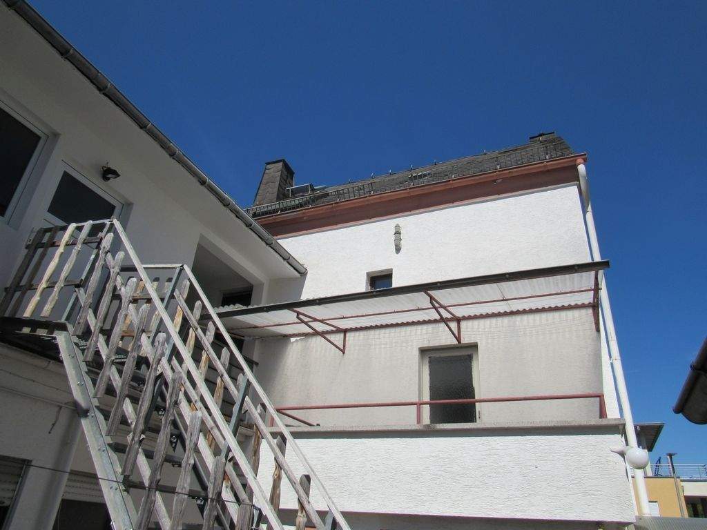 Immobilie in Elz - Schönes Mehrfamilienhaus mit 3 Wohnungen, Nebengebäude, Terrasse, Garage & Garten - Bild 12