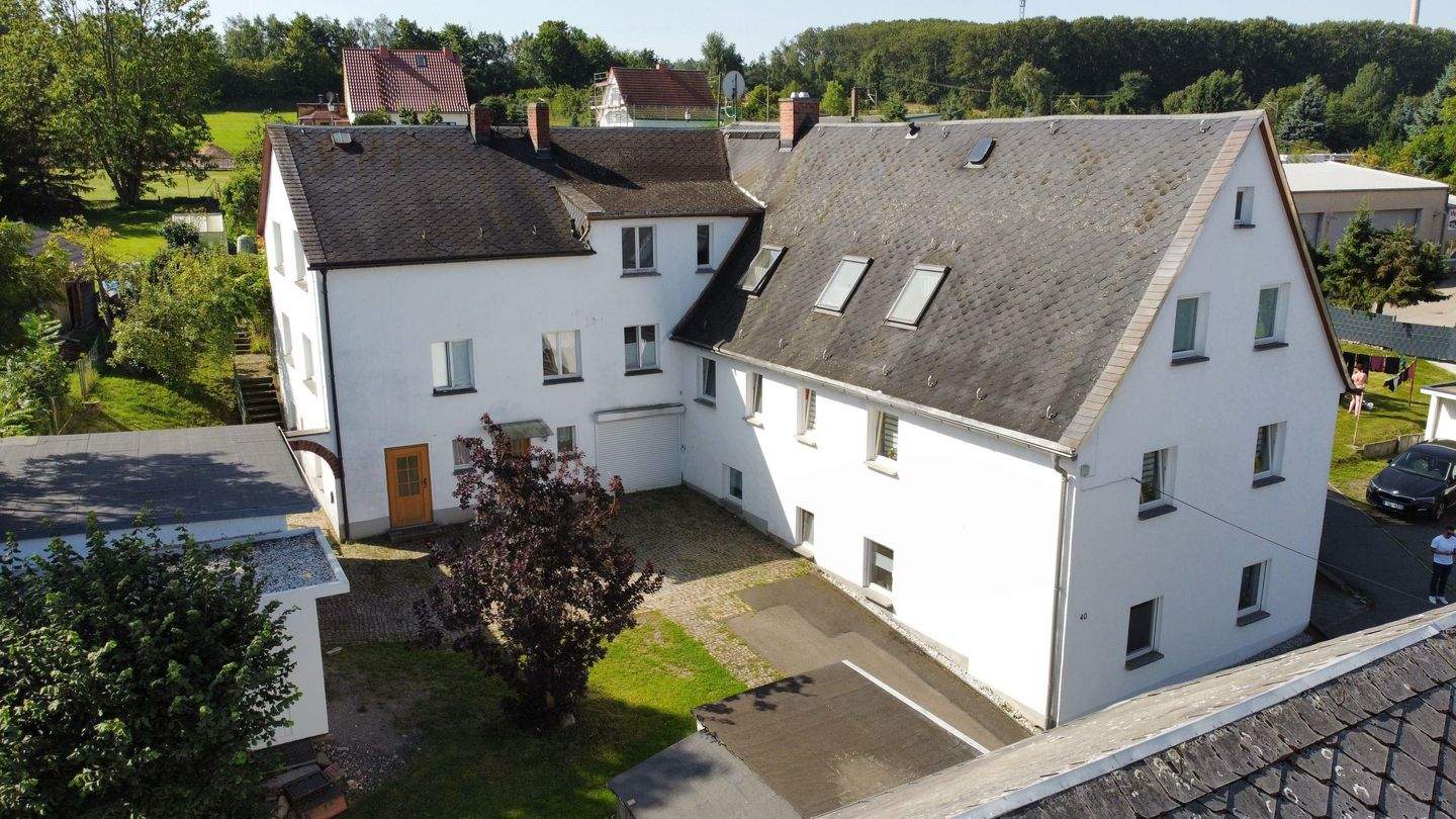 Immobilie in Bobritzsch-Hilbersdorf - Charmantes Mehrfamilienhaus mit großem Potenzial und ländlichem Flair - Bild 1