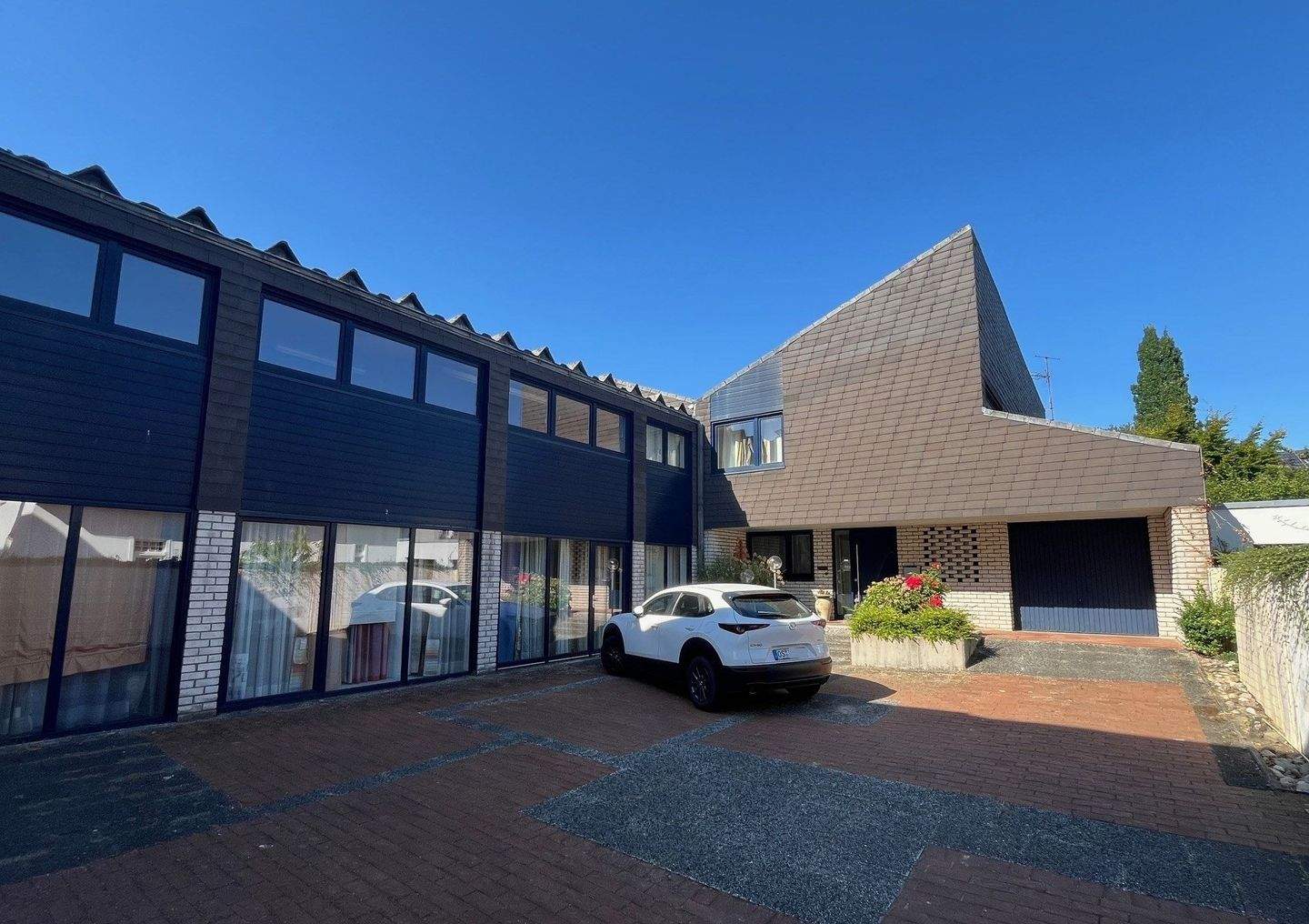 Immobilie in Lengerich - Immobilienpaket mit tollem Architektenhaus und einem Zweifamilienhaus mit Gewerbeeinheit - Bild 16