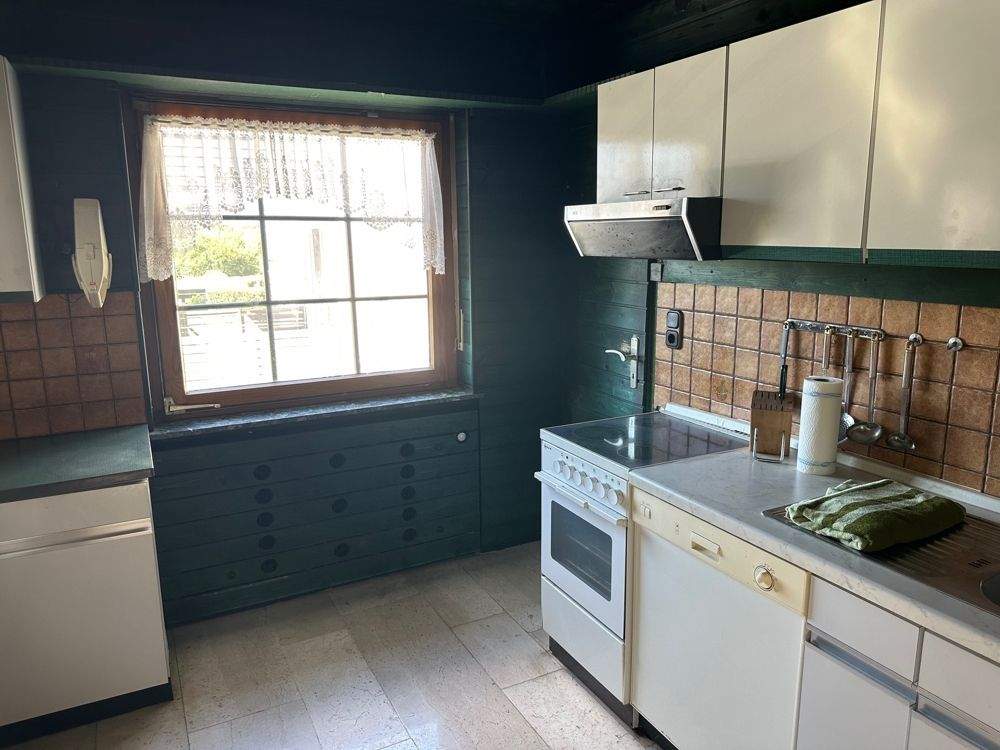 Immobilie in Helsa - Attraktives Einfamilienhaus mit Einliegerwohnung , Garage und Wintergarten in ruhiger Lage von Helsa - Bild 11