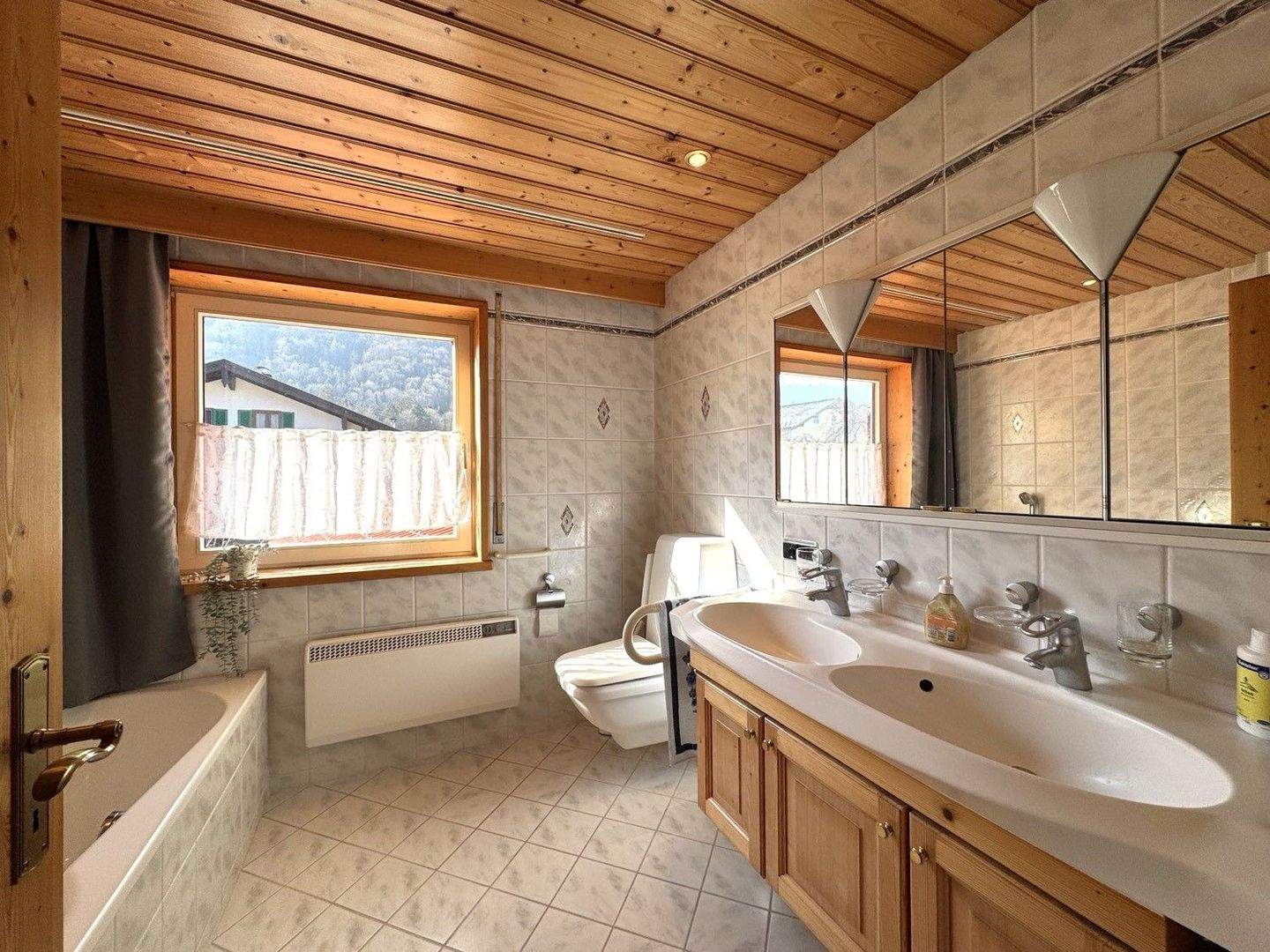 Immobilie in Schleching - Teilerneuerte Süd-West-Haushälfte mit Doppelgarage in stiller Randlage - Bild 21